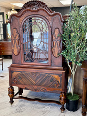Antique Jacobean China cabinet on casters