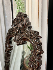 Carved decorative mirror