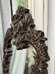 Carved decorative mirror