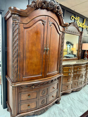 Carved armoire/tv stand