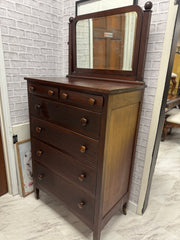 Antique tall chest on casters