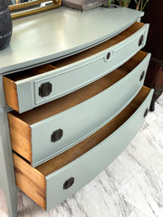 Vintage Hepplewhite-style bow front chest
