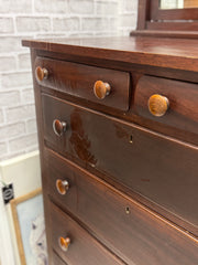 Antique tall chest on casters