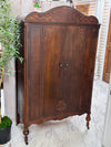 Antique cedar-lined chifferobe on casters