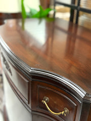 Antique mahogany serpentine chest on chest