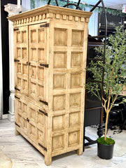 Carved wood armoire