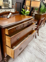 Vintage dresser on casters ￼